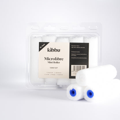 Kibbu microfibre mini roller set in clear plastic packaging with three loose 10mm nap mini rollers on a white background