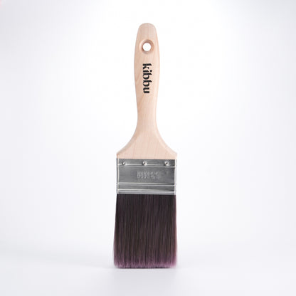 Kibbu paint brush with wooden handle and tapered synthetic bristles on a white background