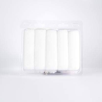 Rear view of Kibbu microfibre mini roller set showing five white 10mm nap mini rollers in clear plastic tray on a white background